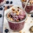 healthy blueberry nice cream in a bowl with toppings