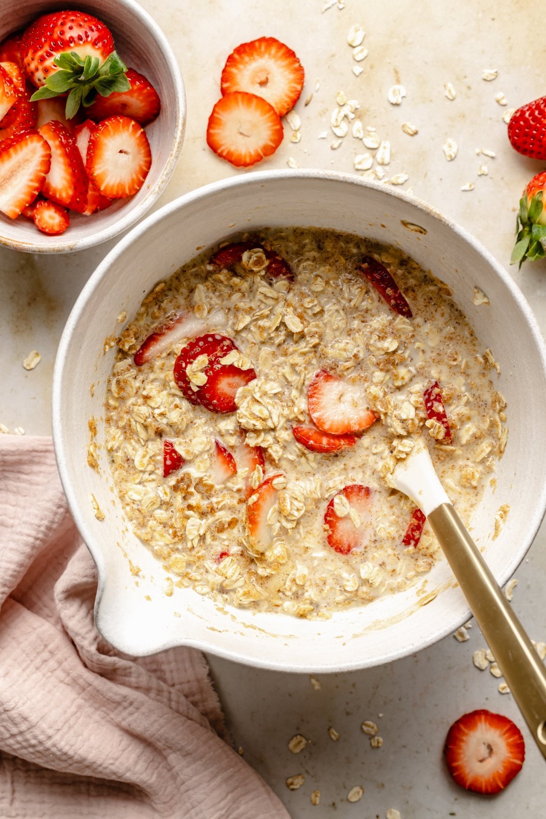 ingredients for strawberry baked oatmeal in a bowl