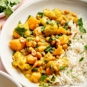 butternut squash curry in a bowl with rice