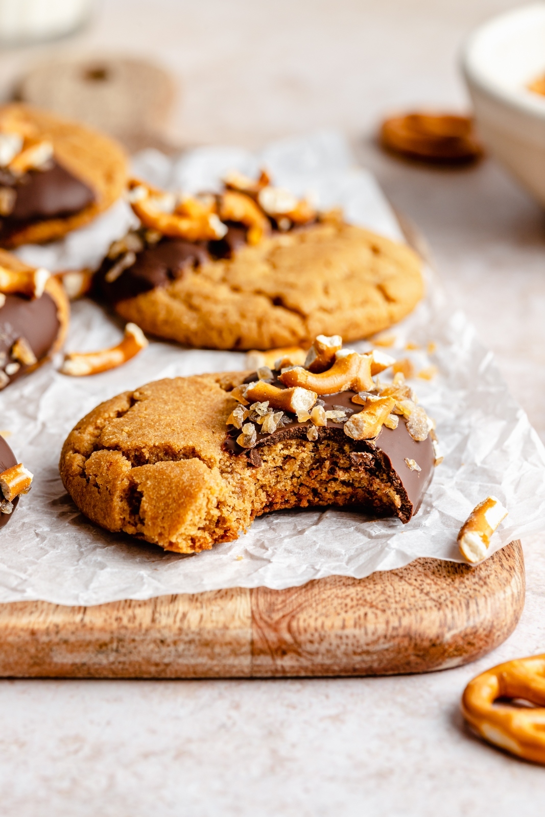 chocolate dipped peanut butter cookie with a bite taken out