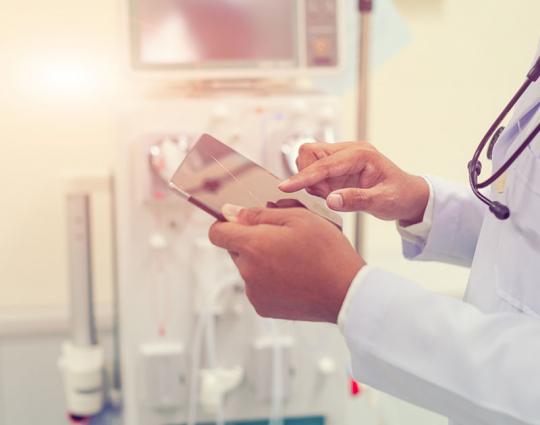 Doctor using clinical decision support tools