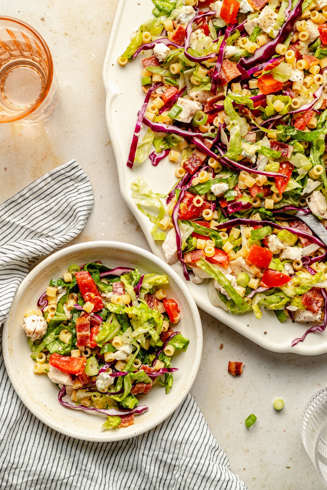 copycat portillo's chopped salad on a platter and in a bowl