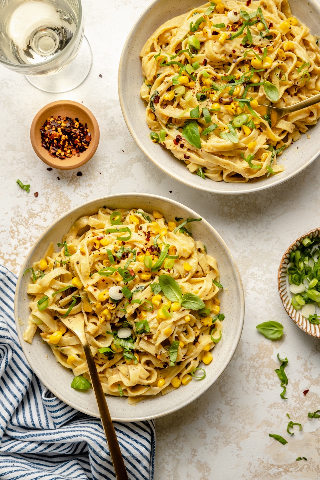 ricotta and corn pasta in two bowls