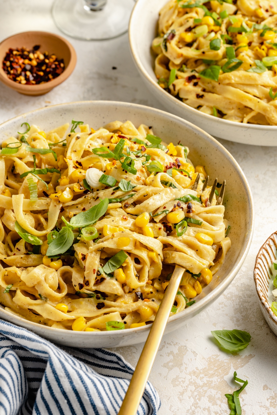 brown butter and corn pasta in a bowl