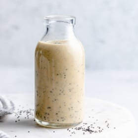 vegan tahini poppy seed dressing in a bottle