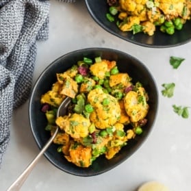 curry cauliflower sweet potato salad in a bowl