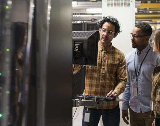 IT team discussing cybersecurity frameworks