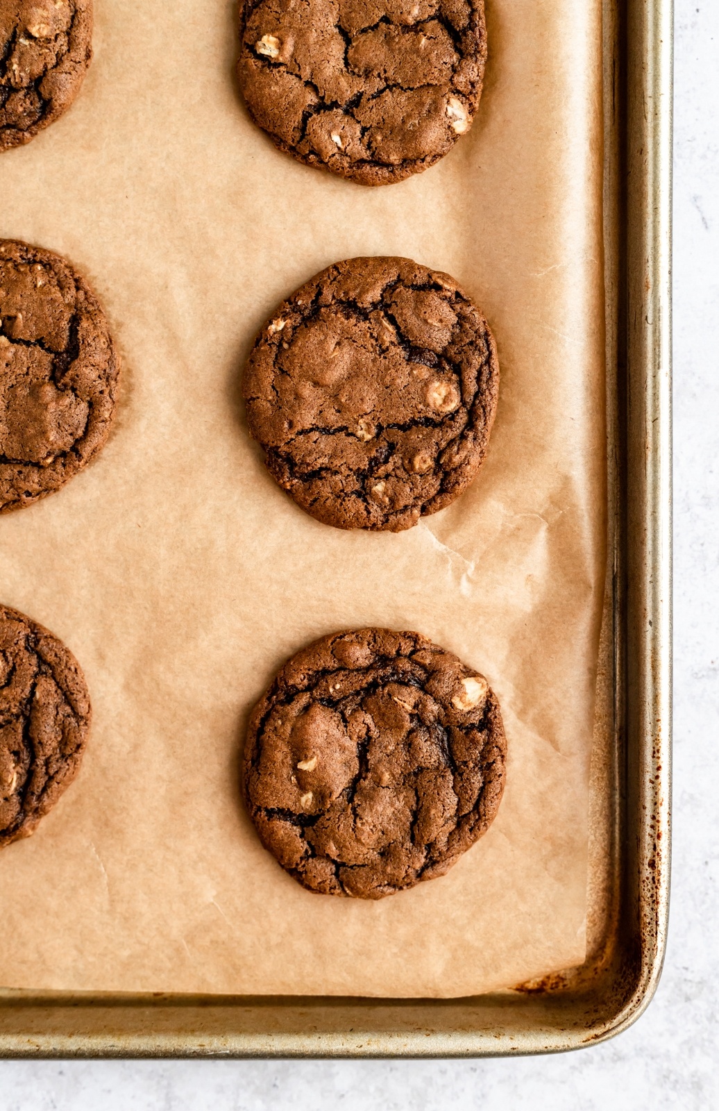 gingerbread oatmeal cookies on a baking sheet