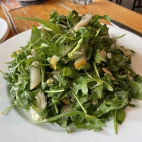 arugula salad on a plate