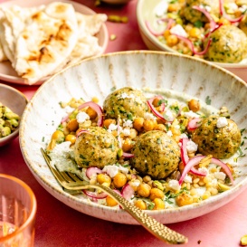 pistachio chicken meatballs with chickpeas and couscous in a bowl