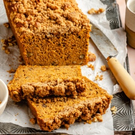 butternut squash bread sliced on a cutting board