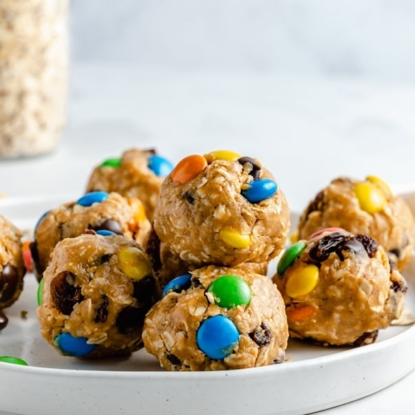 no bake monster cookie energy bites on a plate