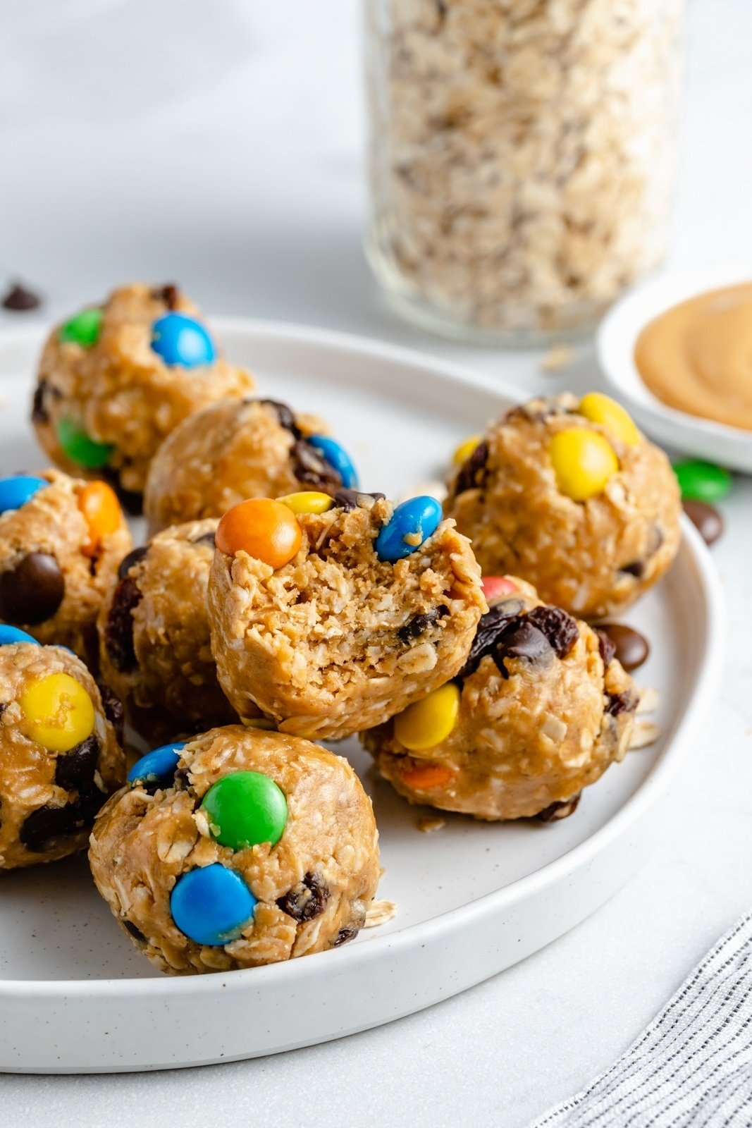 no bake monster cookie energy bites on a plate