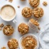 zucchini carrot muffins next to a mug of coffee