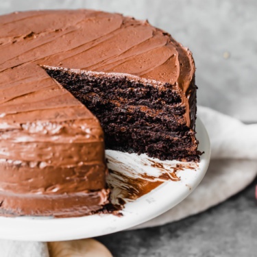 paleo chocolate cake on a cake stand