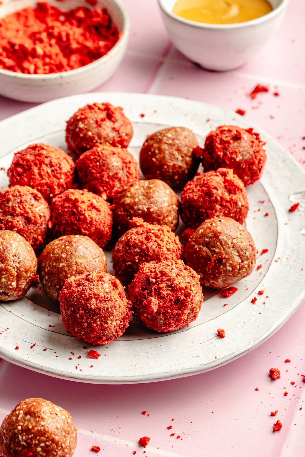 no bake peanut butter and jelly energy bites on a plate