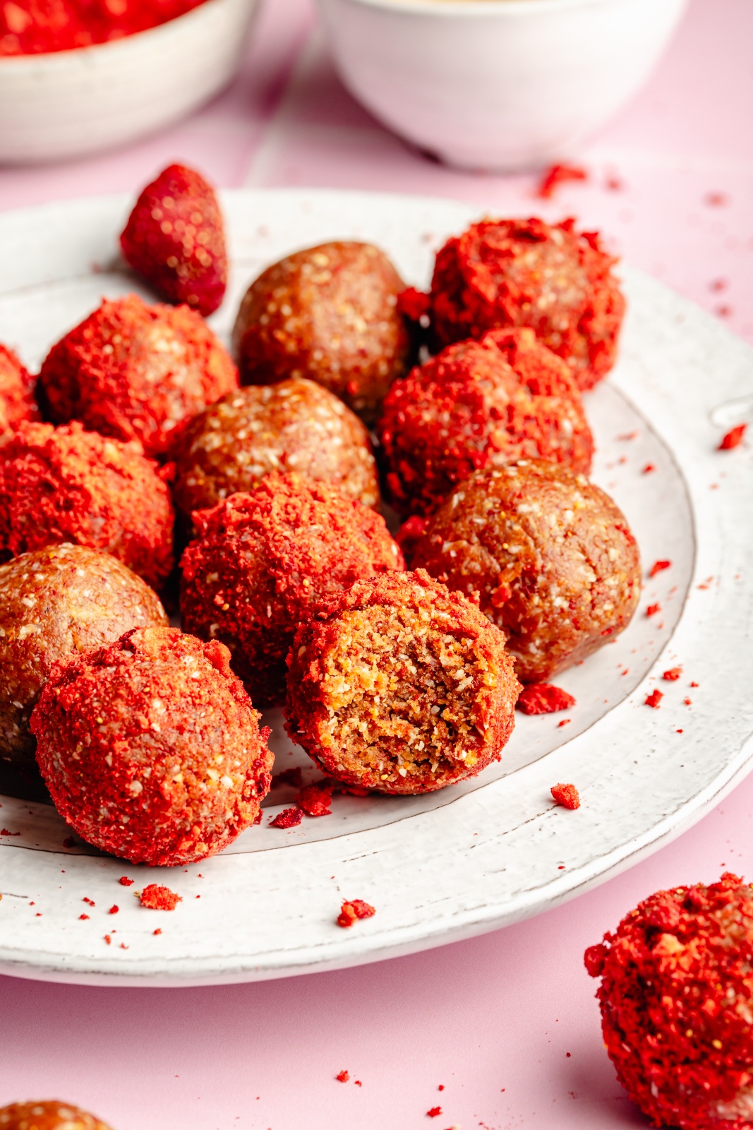 peanut butter and jelly energy bites on a plate