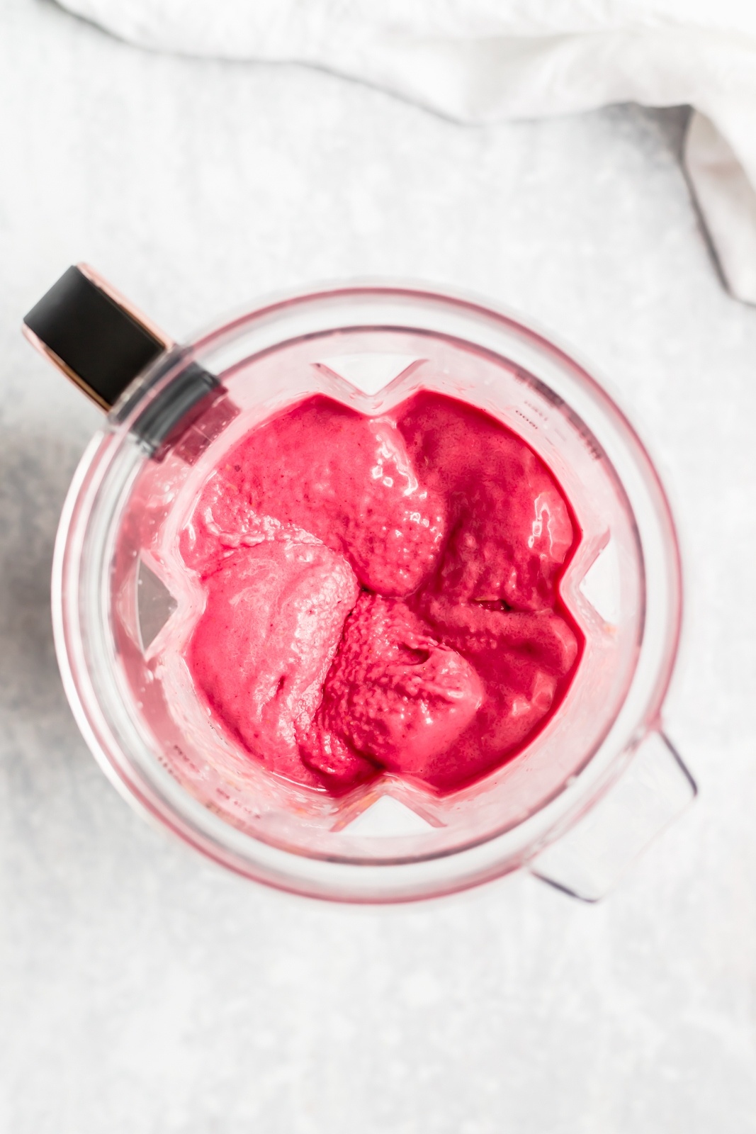 shot of overhead of blender with pink smoothie