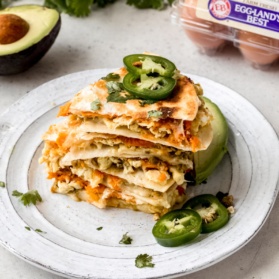 breakfast quesadillas in a stack on a plate