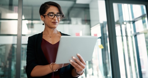 Business woman holding a tablet 