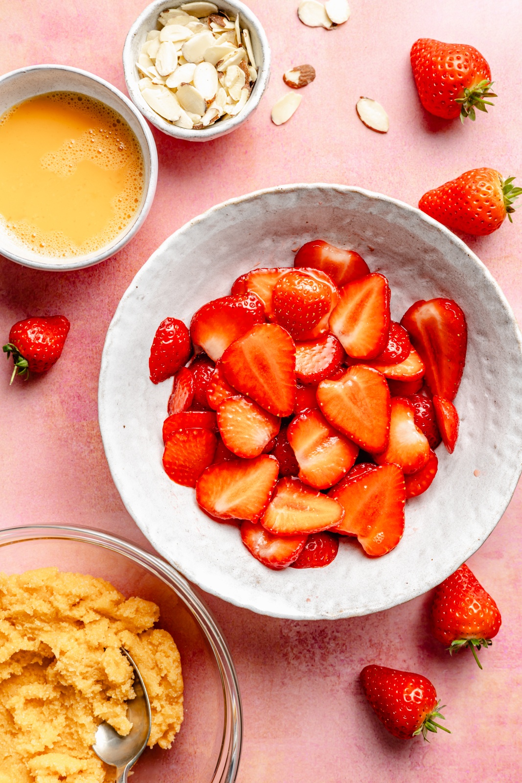 ingredients for strawberry almond puff pastry tarts in bowls