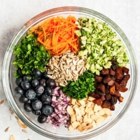 ingredients for a healthy broccoli salad with no mayo in a bowl