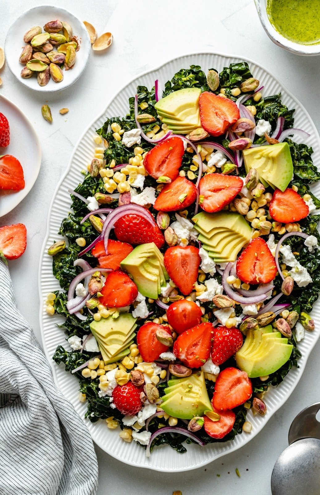 strawberry kale salad on a platter