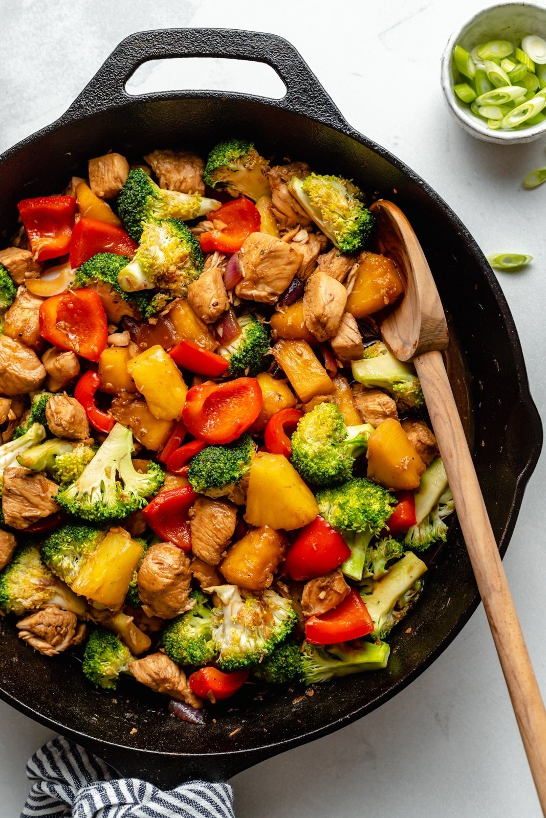 pineapple chicken stir fry in a pan