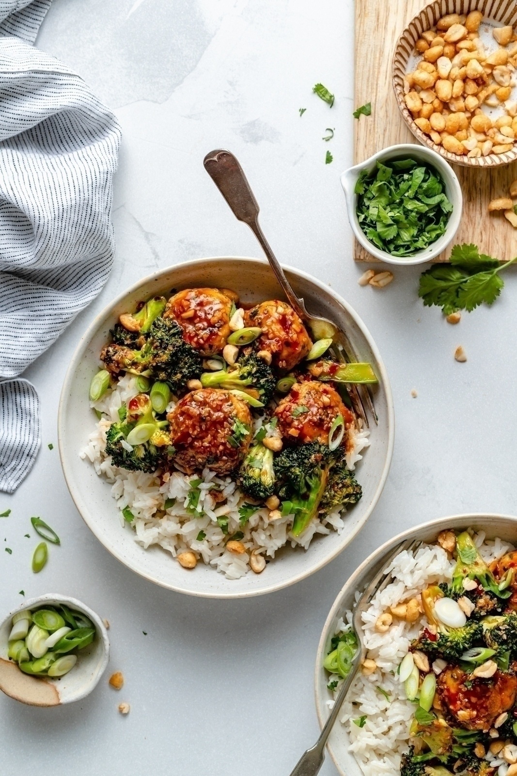 sweet and spicy sesame chicken meatball bowls with rice and broccoli