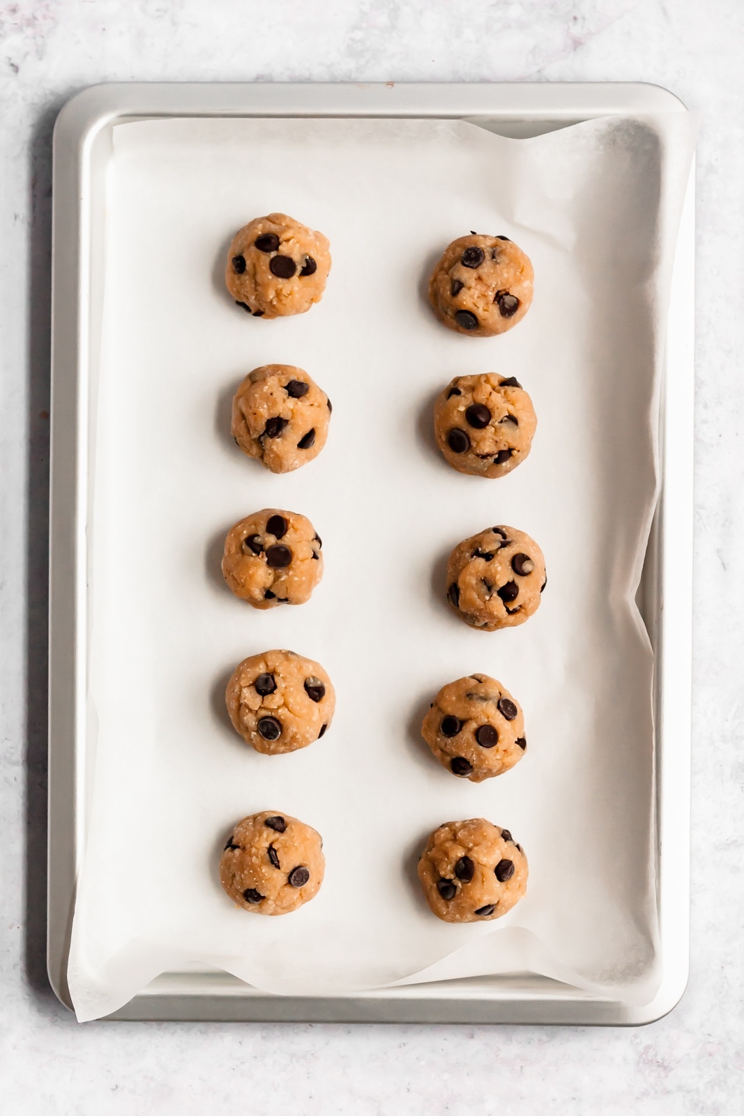 healthy cookie dough bites on a baking sheet