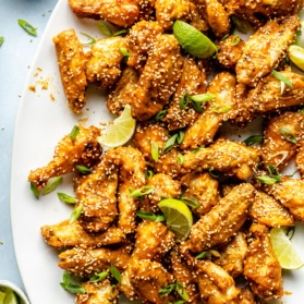 Thai peanut chicken wings on a platter