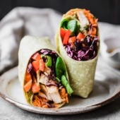 thai peanut chicken wraps on a plate