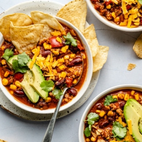 healthy turkey chili in three bowls