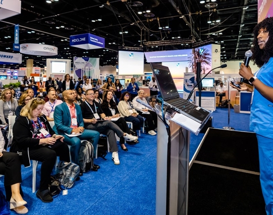 Nurse giving a presentation at HIMSS24