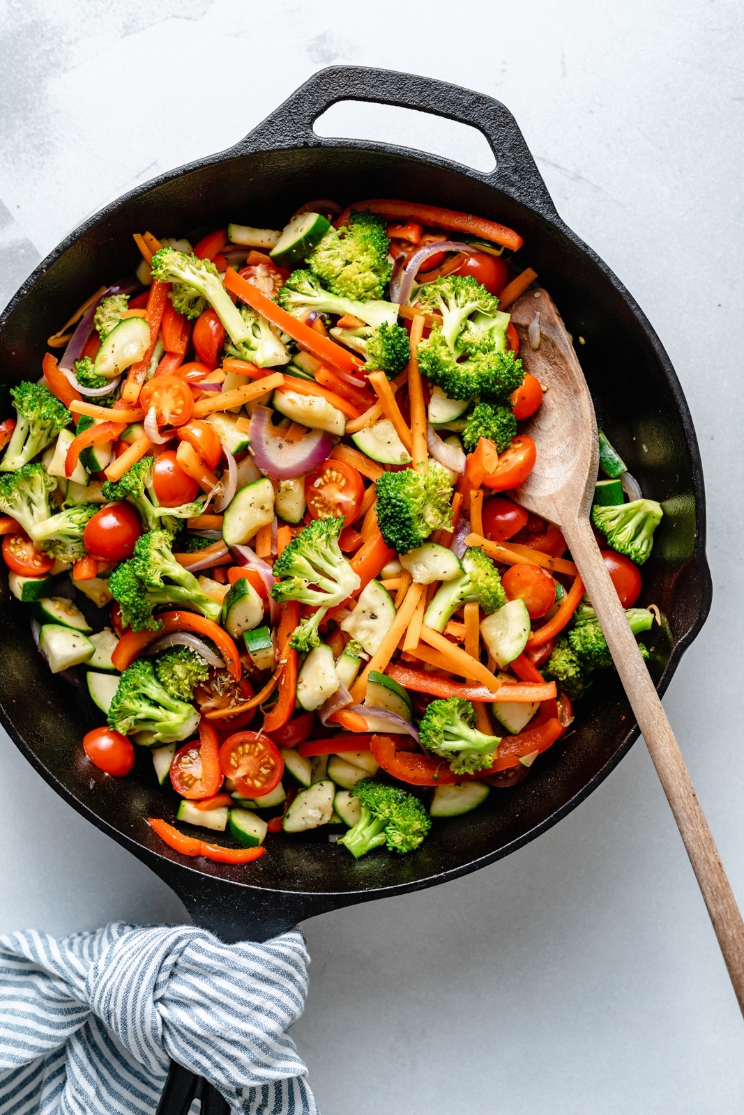 cooking vegetables in a skillet to make healthy vegan pasta primavera