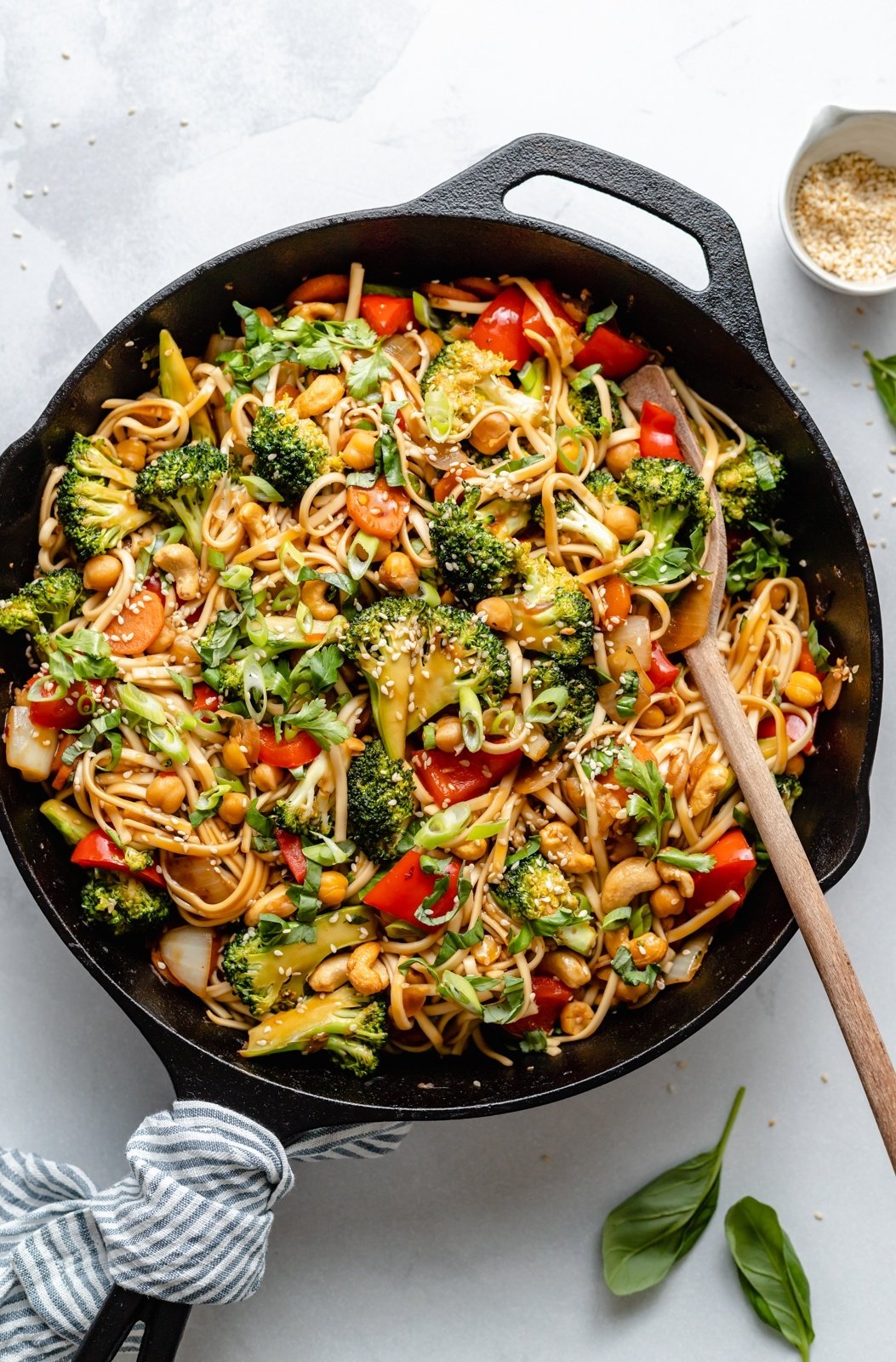 sesame noodles with vegetables in a skillet