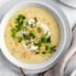 vegan corn chowder in a bowl with a spoon