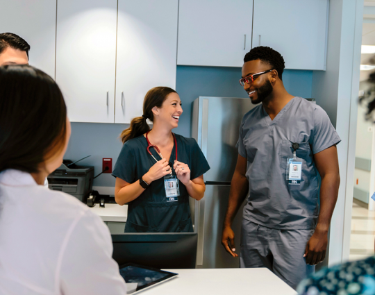 Providers discussing health informatics Providers discussing health informatics