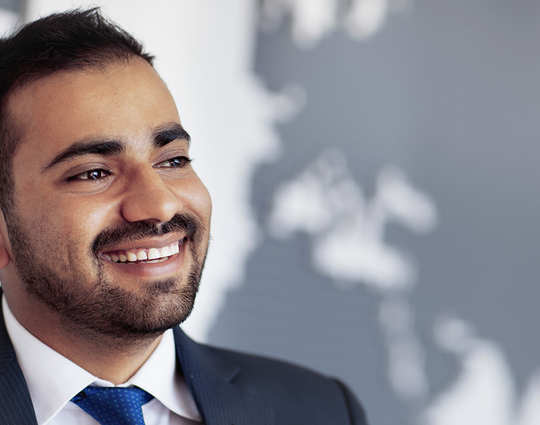 A healthcare professional benefiting from global health informatics core competencies A healthcare professional benefiting from global health informatics core competencies