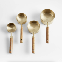 wood and gold measuring cups